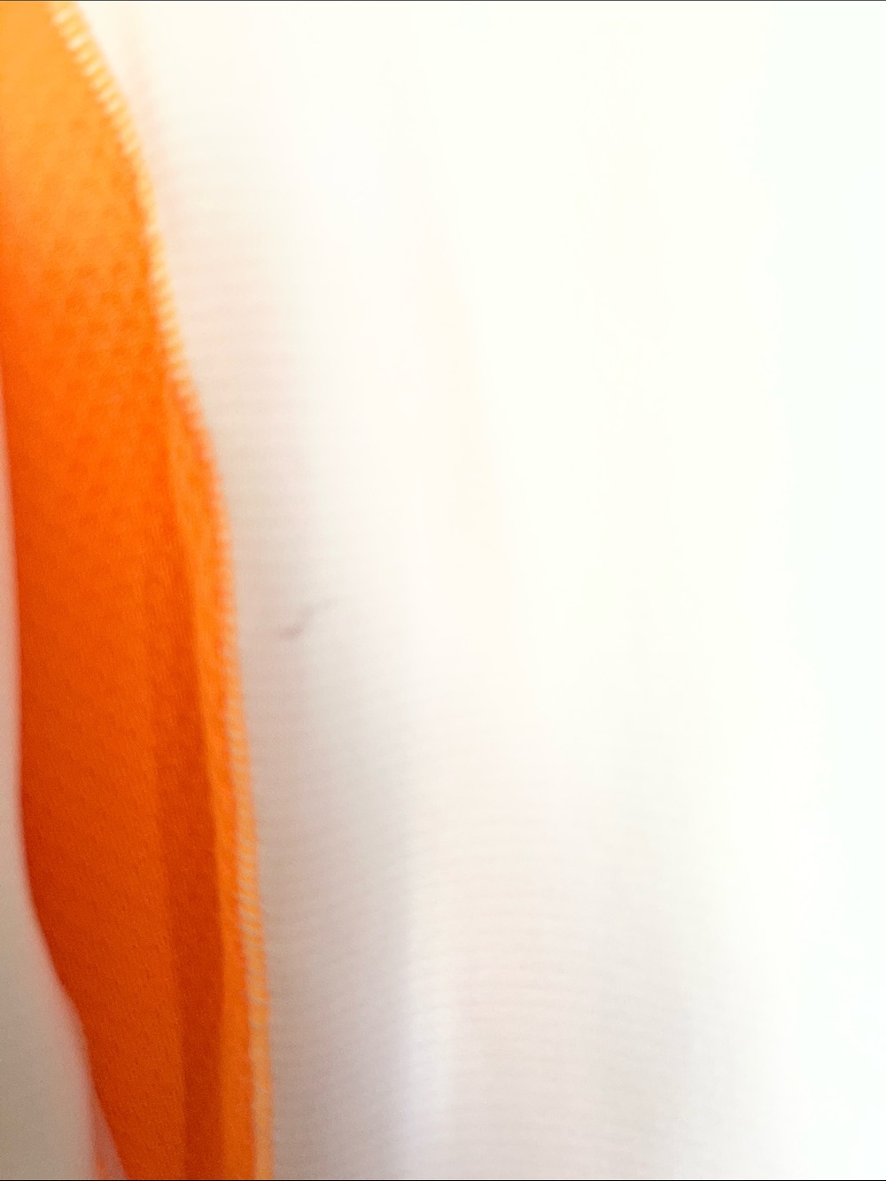 The North Face White Pullover with Bright Orange Panels and Teal Zipper - Picture 3 of 4